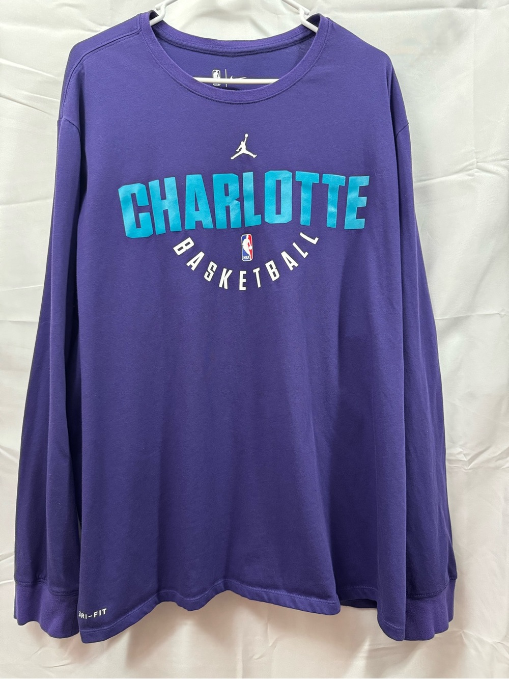 Nike NBA Jordan Purple Long Sleeve Tee with Teal Charlotte Hornets basketball